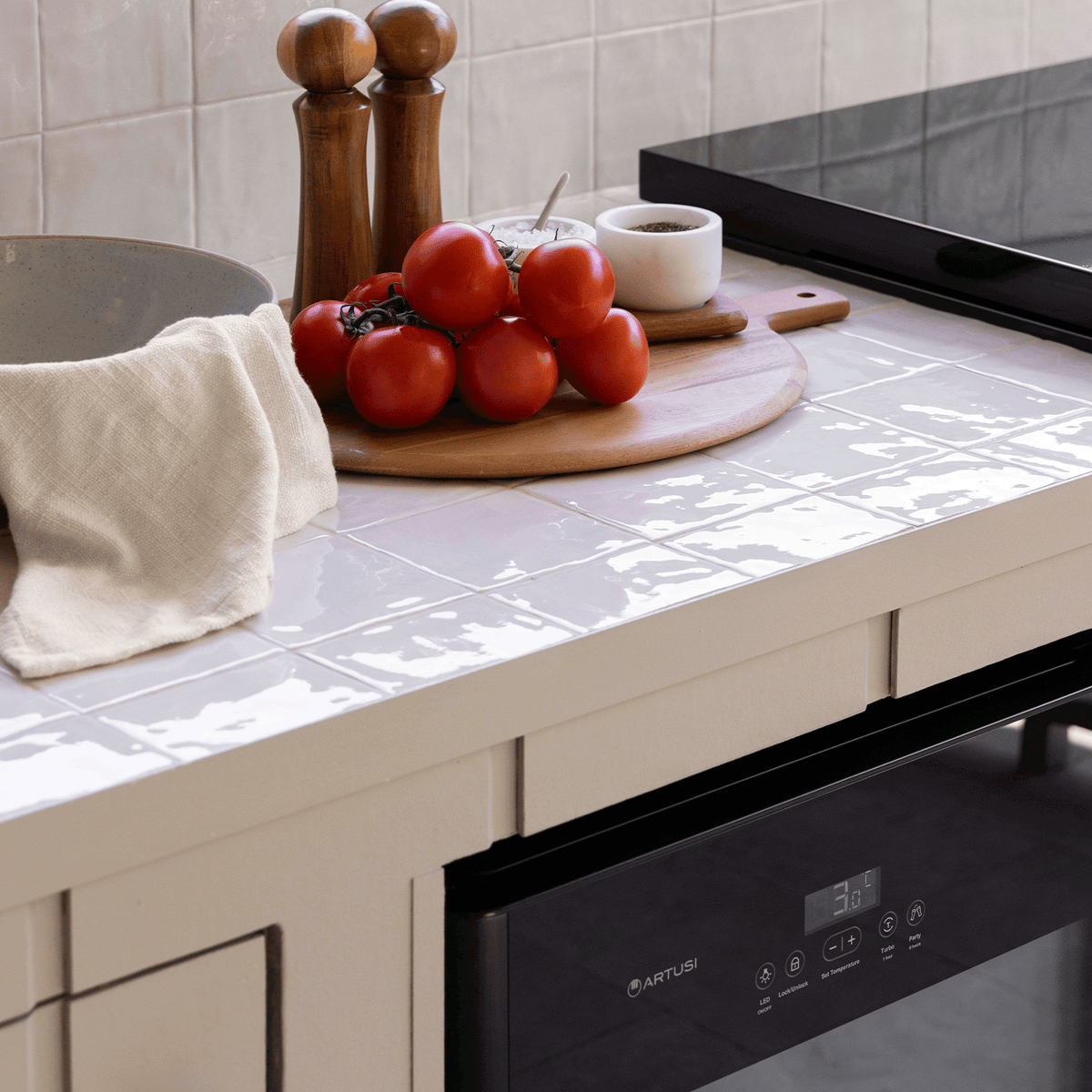 Artusi ABC1B single-door beverage centre - touch-control panel beneath a tiled benchtop